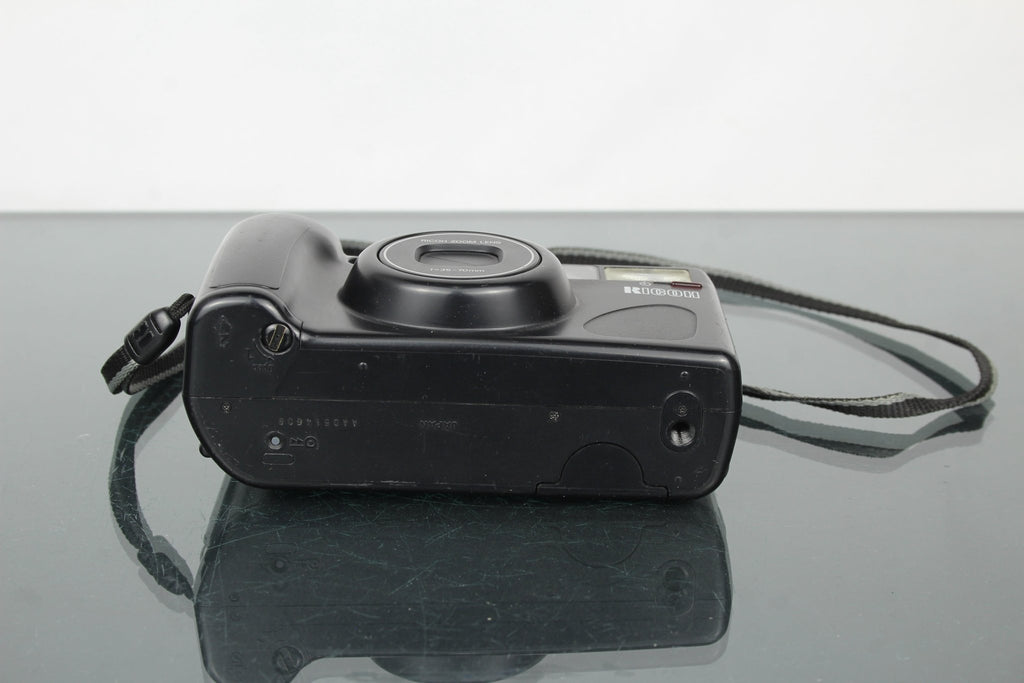 Ricoh Shotmaster Zoom 70 - Dutch|Thrift